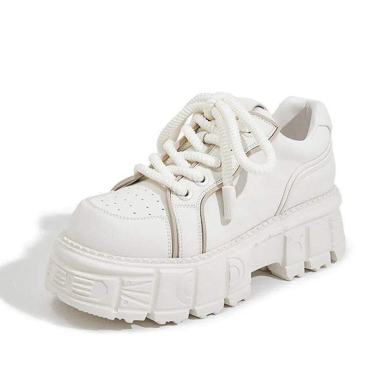 Women's beige muffin bottom leather casual shoes with wedge heel on white background