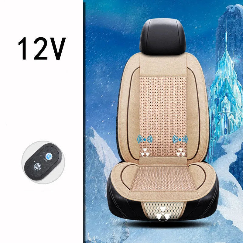 Square black car ventilation seat cushion with power cord on a car seat.