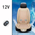 Square black car ventilation seat cushion with power cord on a car seat.
