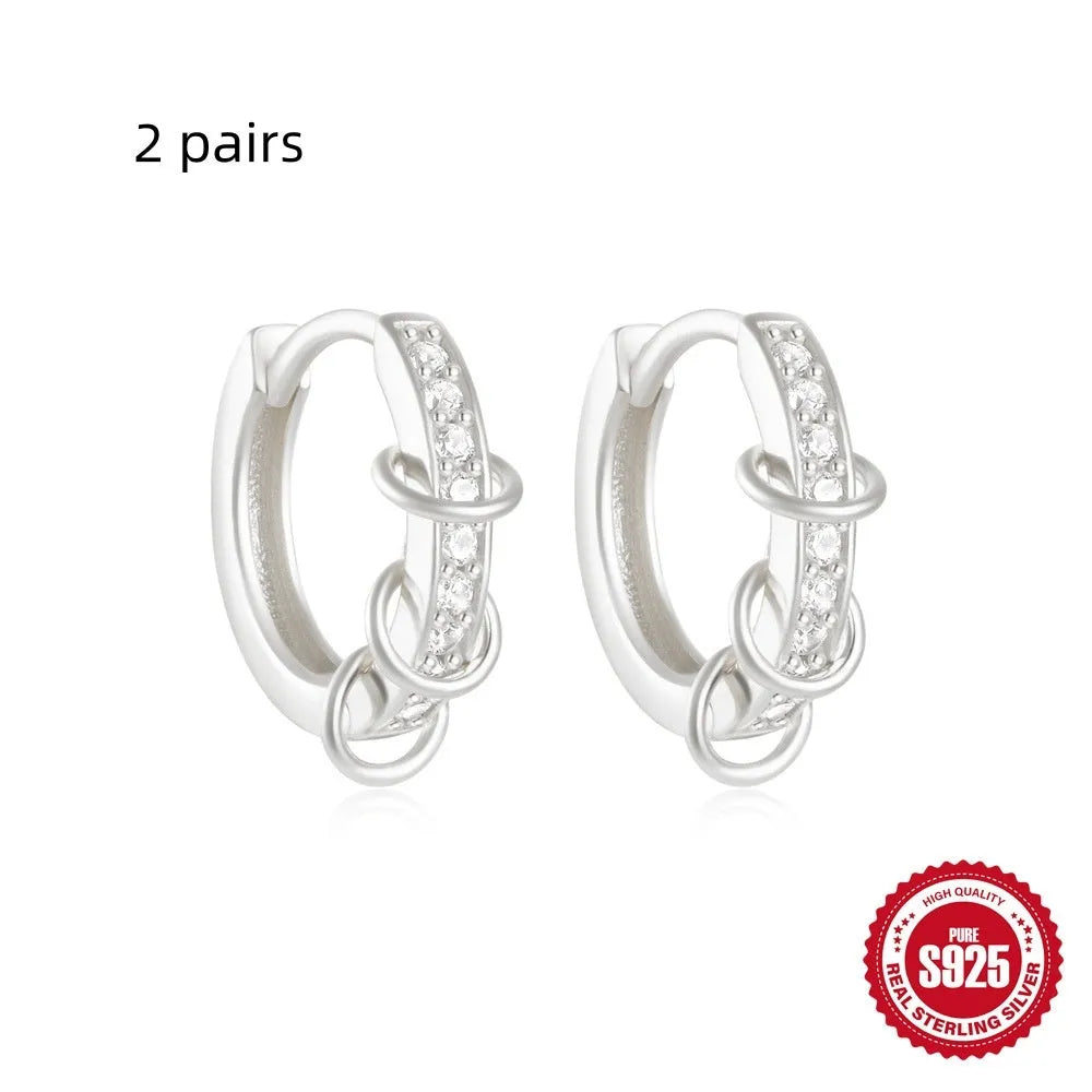 Sterling silver geometric stud earrings with small round diamond accents in gold or silver electroplated finish