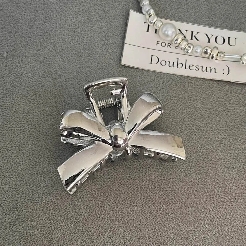 Silver metal hair barrette claw clip with electroplated finish and decorative design