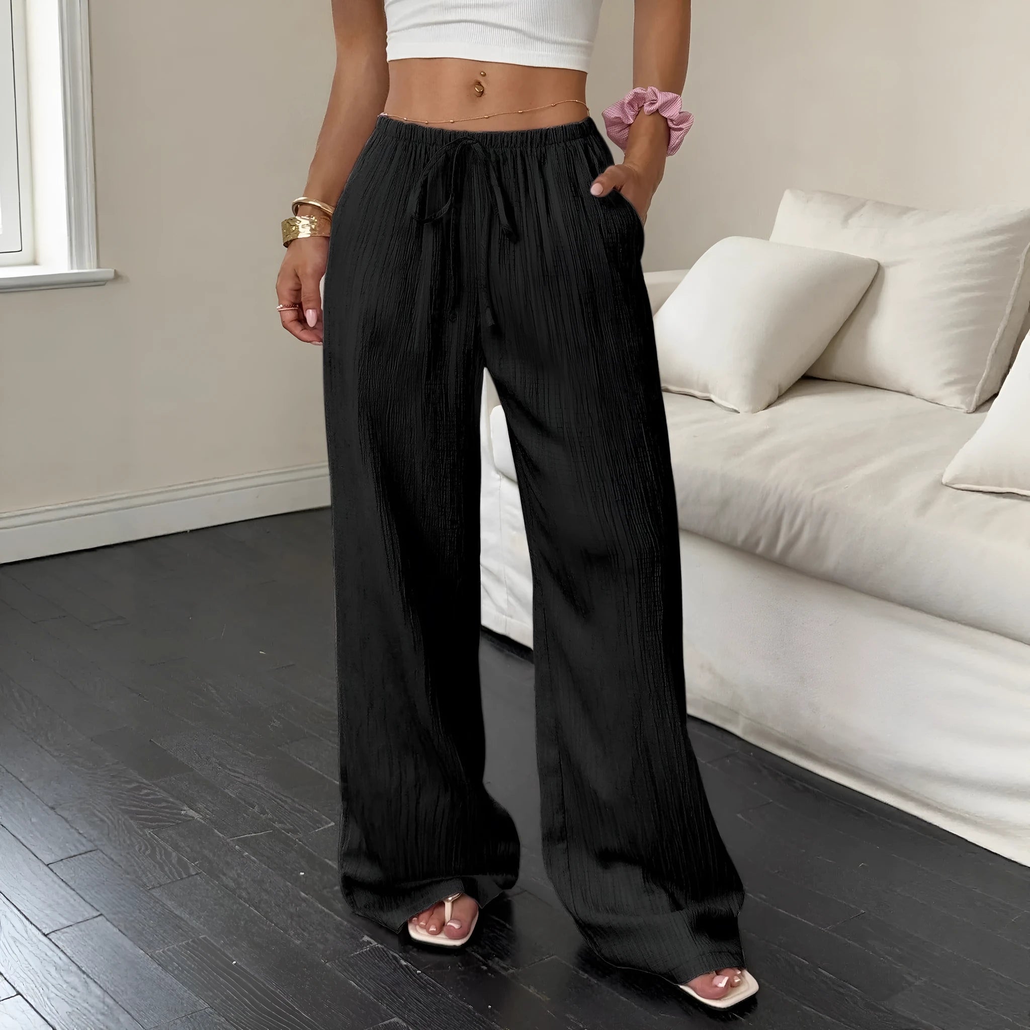 Women's black wide-leg trousers with lace-up waist detail