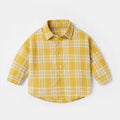 Boys' long sleeve cotton shirt with lattice and cartoon pattern in khaki colour.