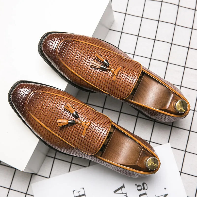 Men's black pointed toe slip on shoes with tassel detail on artificial PU upper