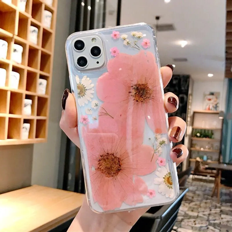 Floral pattern phone case for iPhone showing pink flower design on TPU back cover