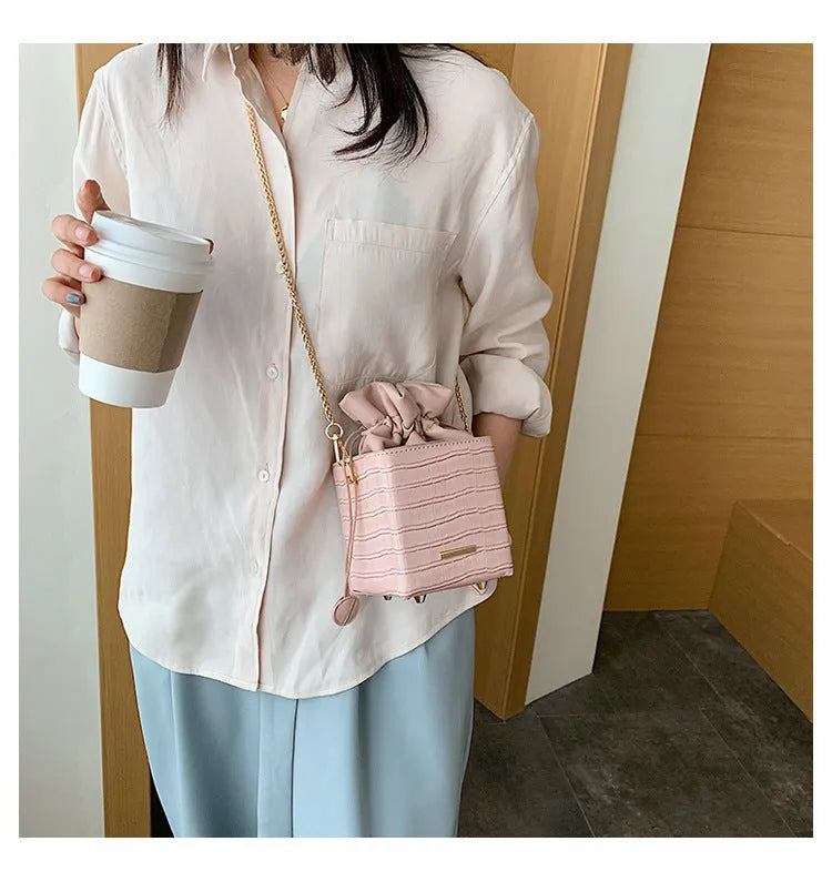 Small Korean-style chain messenger bag with drawstring closure in multiple colour options