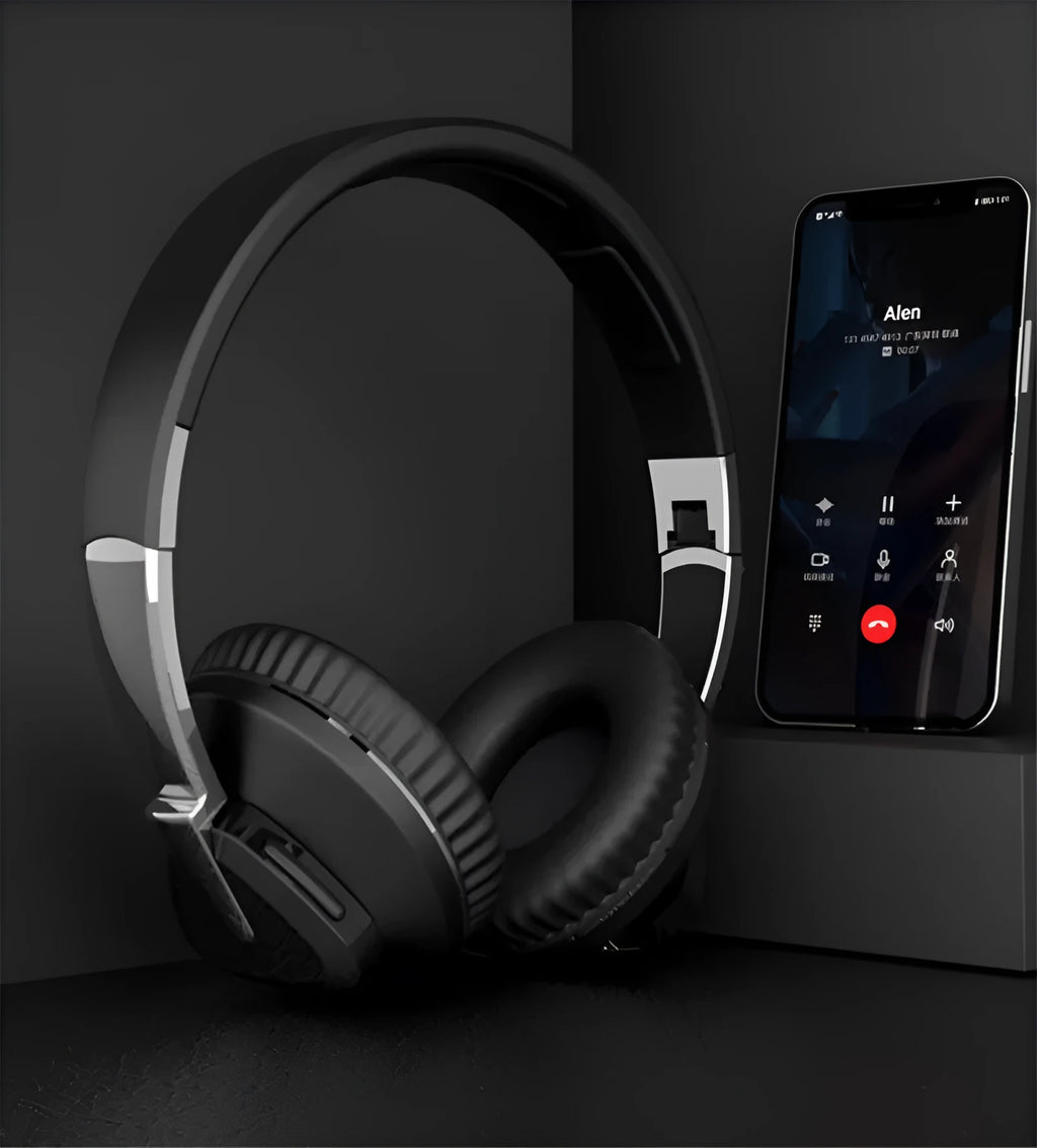H3 Wireless Bluetooth over-ear headset with all-inclusive ear cups in black, shown with AUX cable.