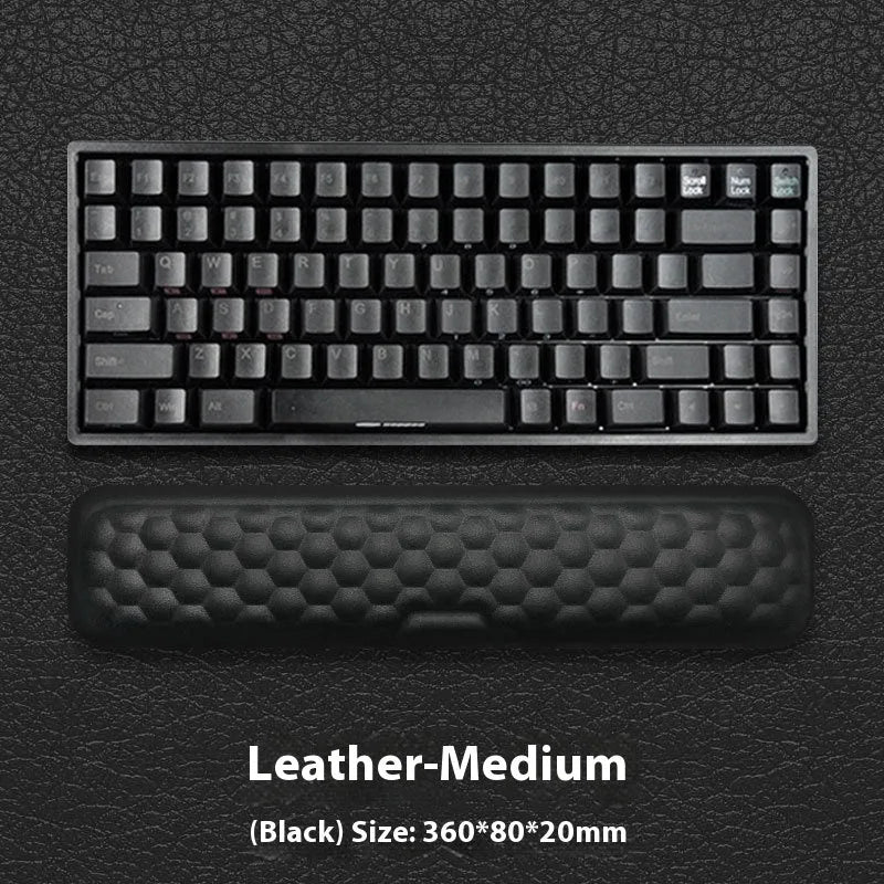Memory foam mouse wrist rest pad with silicone base in black cloth cover option on desk