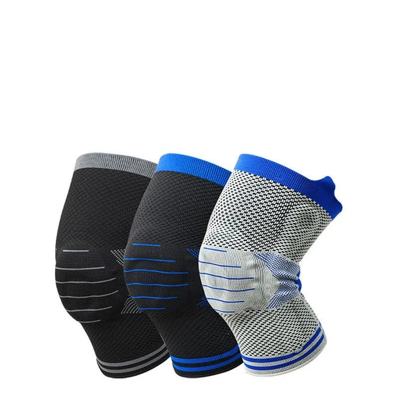 Cotton knee pads with silicone massage and spring bar shock absorber in black and blue colour combination.