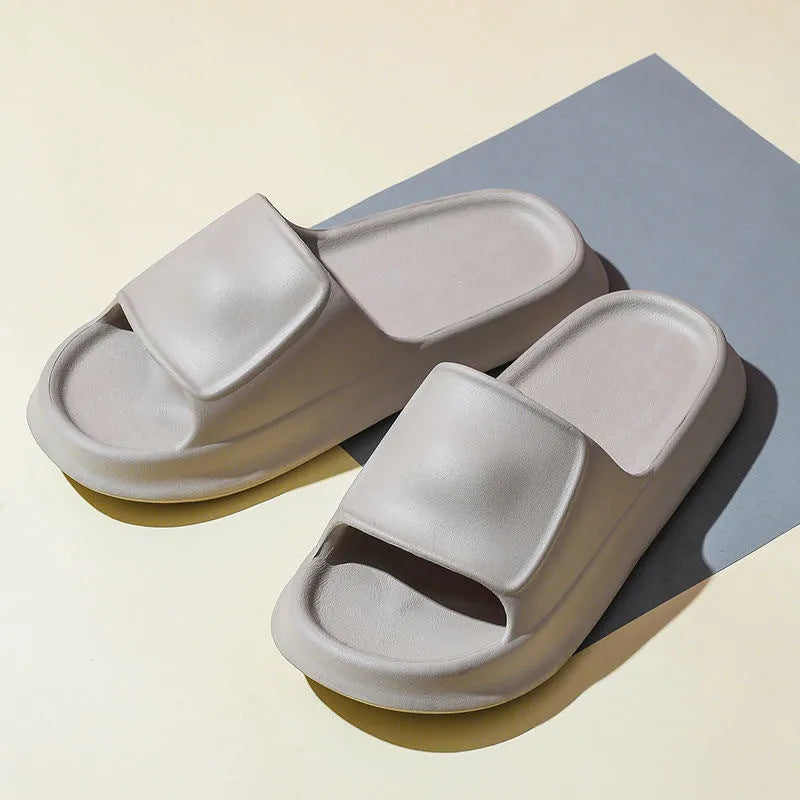Pair of thickened EVA flip-flop slippers in a chosen colour, showing the non-slip sole and unisex design.