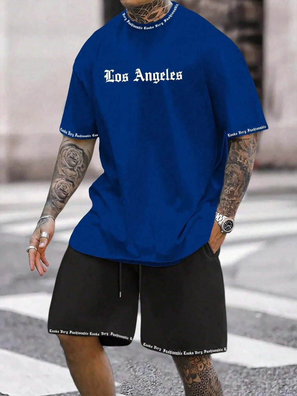 Sports style short-sleeved shorts set with printed pattern, loose fit shorts, and quick-dry fabric