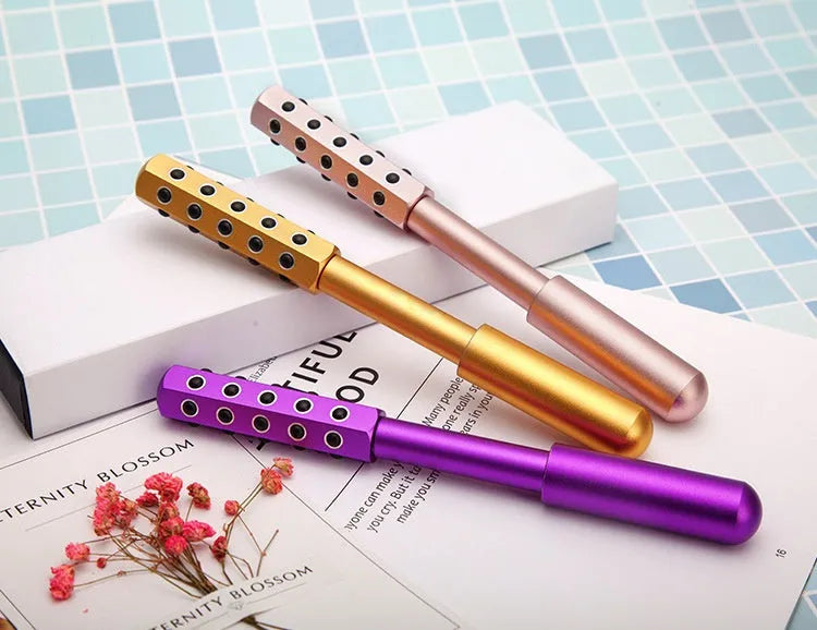 Purple germanium particles facial massage roller with 24 balls and 193mm handle for eye contour treatment