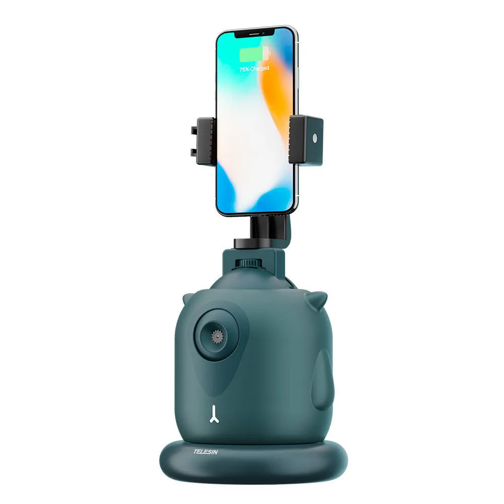 Dark green AI face recognition gimbal showing 360° rotation with smartphone mounted