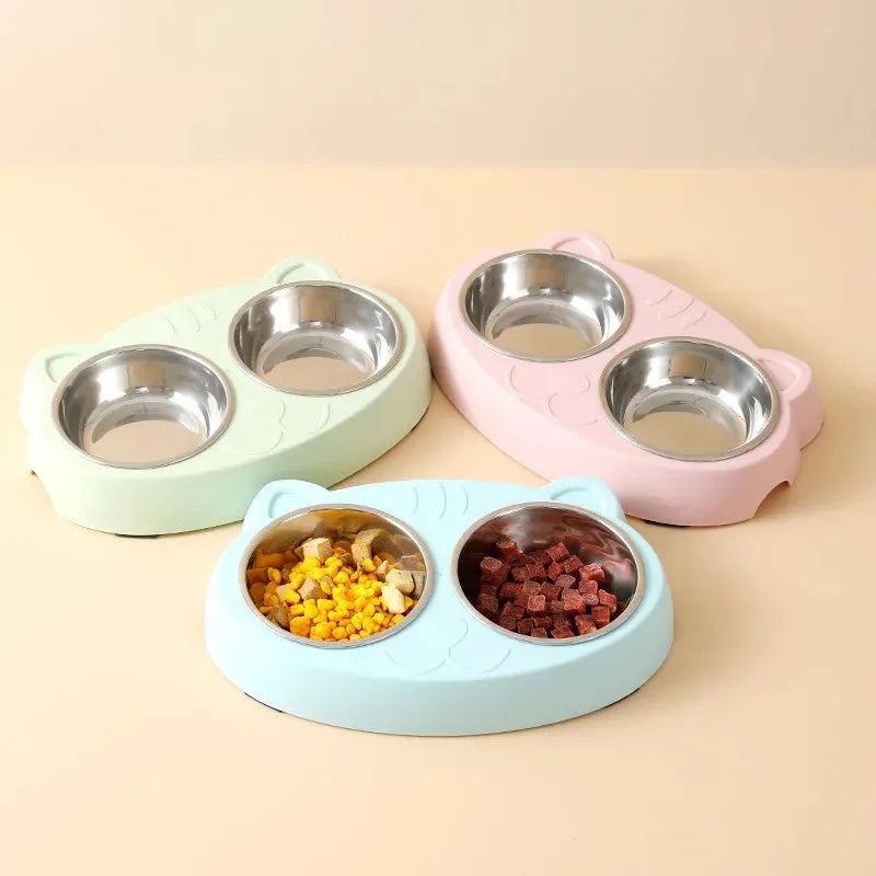 Blue macaron-shaped plastic pet feeding tray with two bowls for cat or dog food and water.