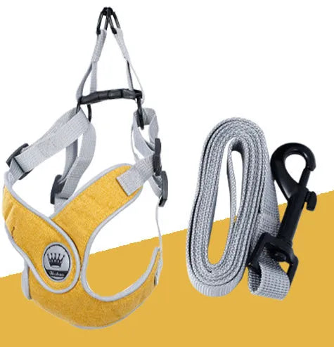 Green adjustable mesh dog harness with reflective strips and a metal D-ring on a dog.