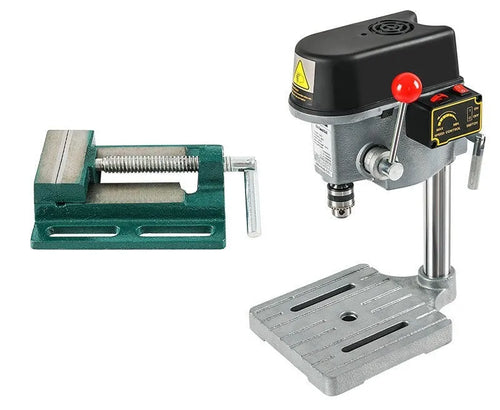 Bench drilling machine with cross bench pliers on workbench