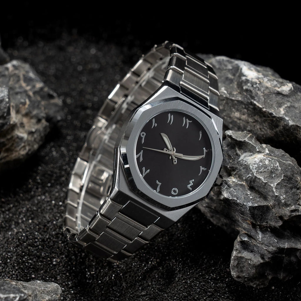 Men's stainless steel business casual quartz watch on wrist, showing 10mm thickness and black silver scale dial.