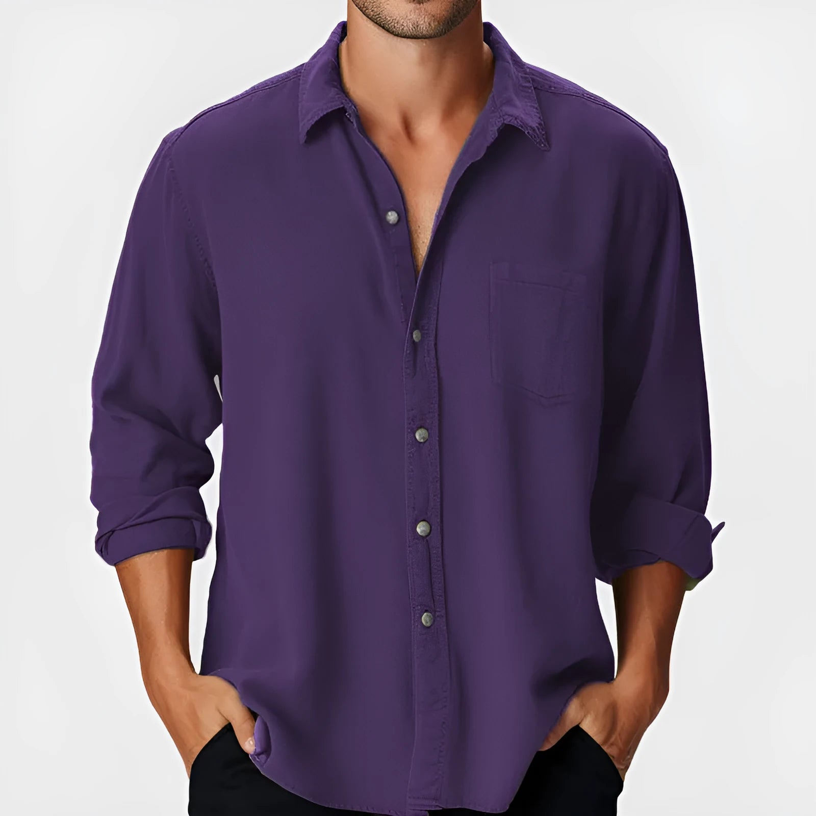 Man wearing a loose-fitting long sleeve beach shirt with a stand collar, available in various colours.