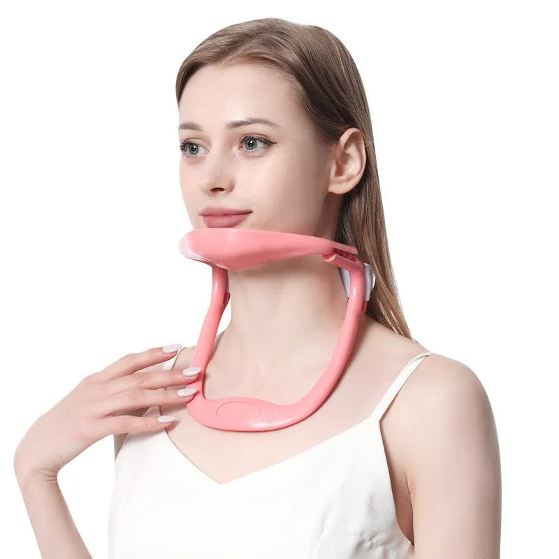 White PP plastic neck and shoulder support brace for posture correction on a grey background.