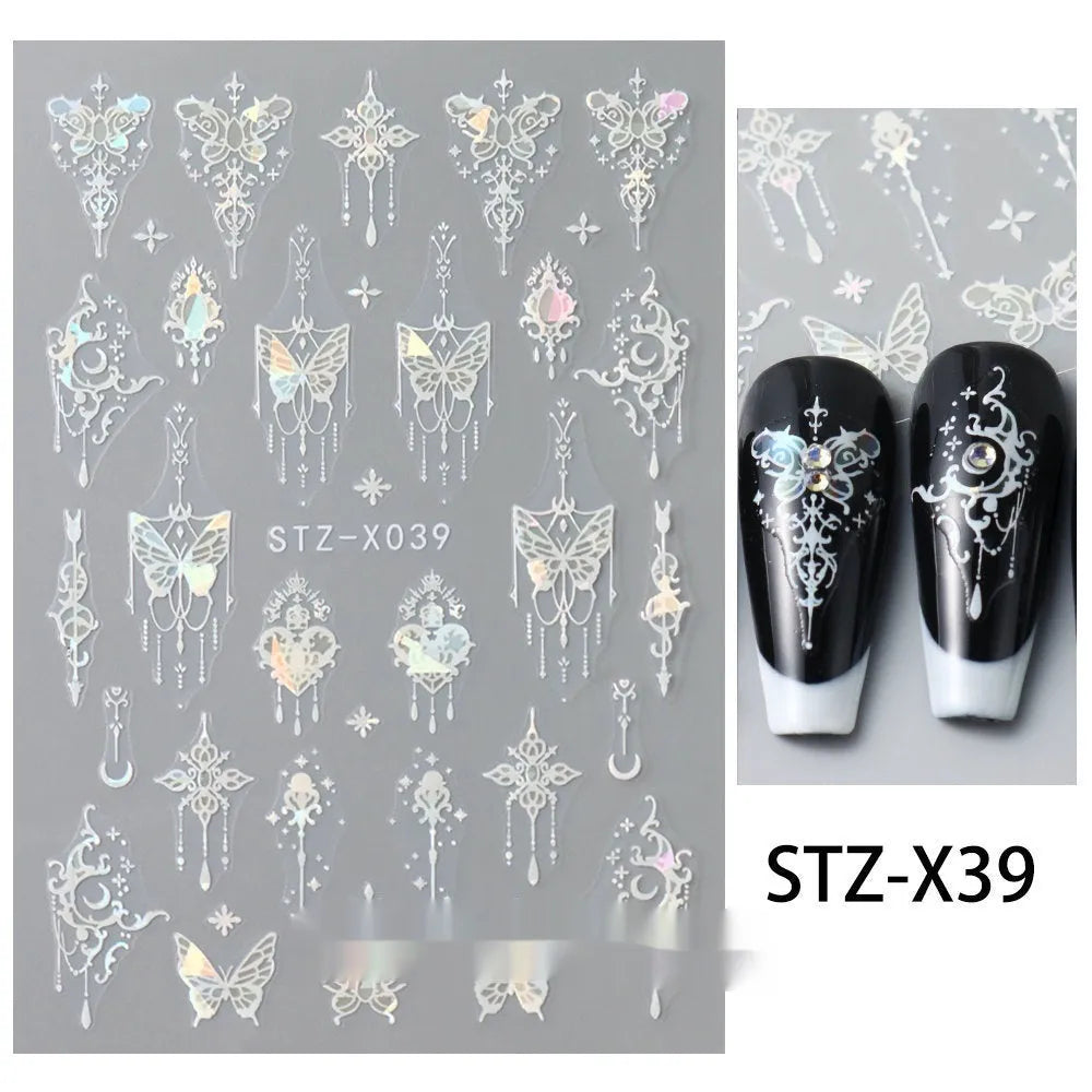 Close-up of a cartoon-style nail sticker with black and silver strips and a love pattern design on a fingernail.