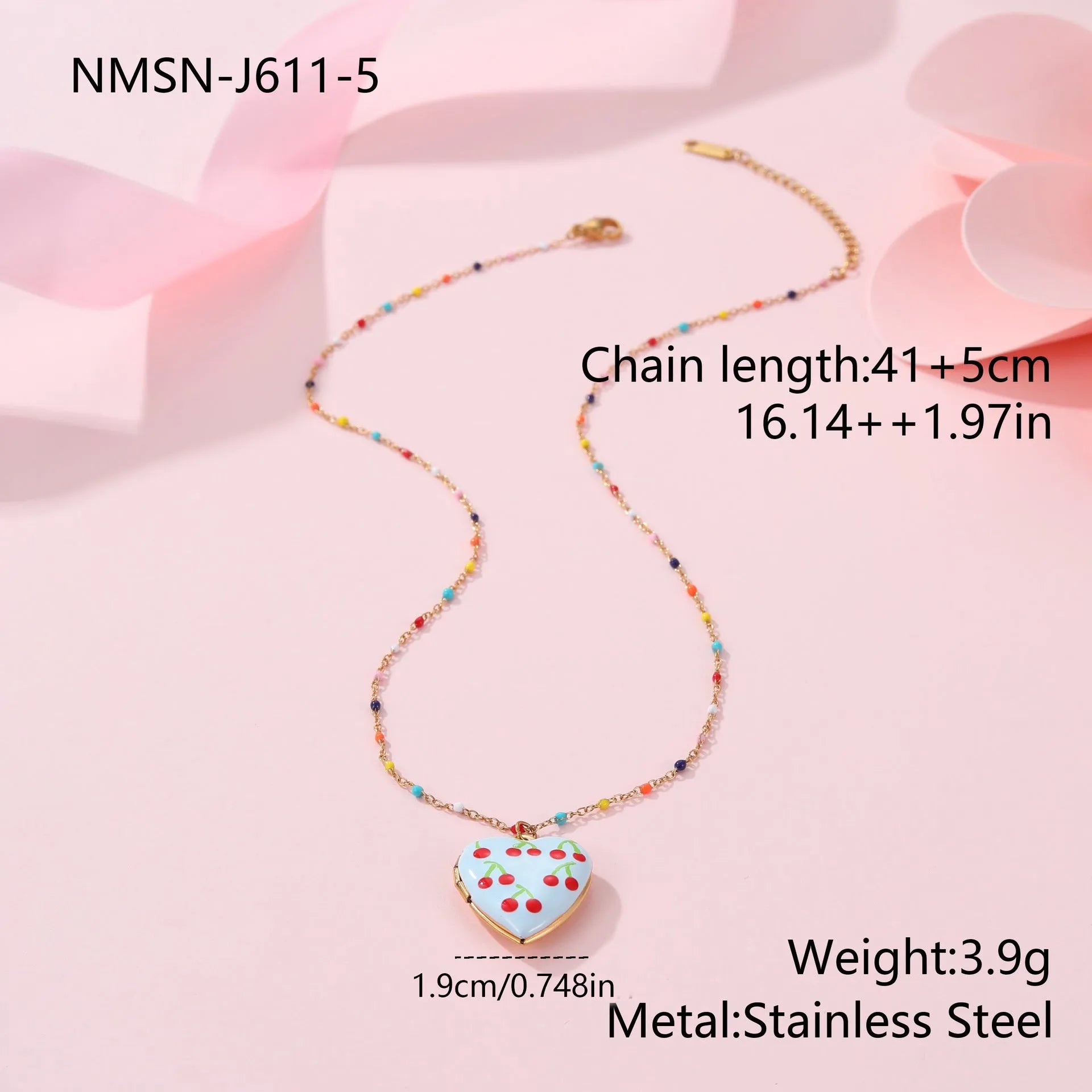 Gold-plated heart-shaped fruit pendant necklace on a stainless steel chain, showing grape design detail.