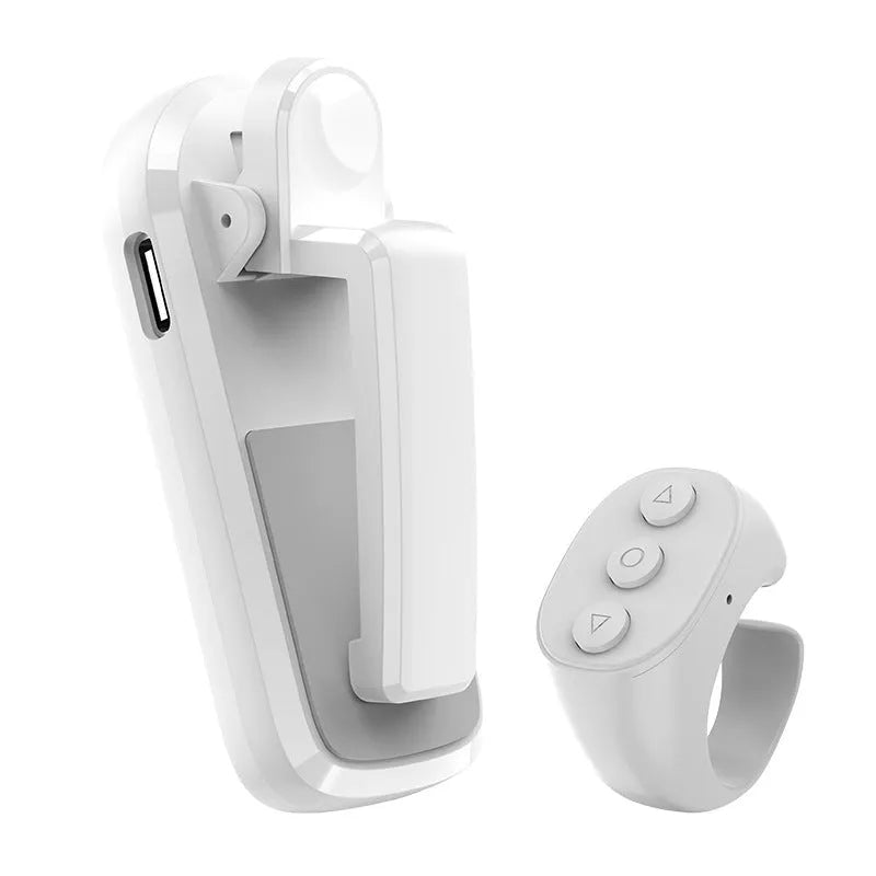 Wireless page turner remote control and clicker for e-readers and tablets in black, white, or pink.