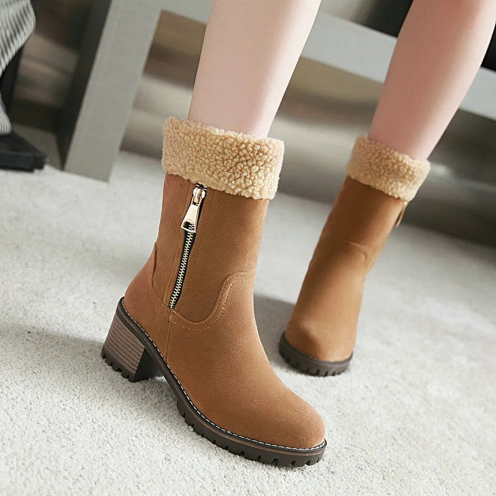 Snow boots with rubber sole and plush lining in black, grey, green, or orange.