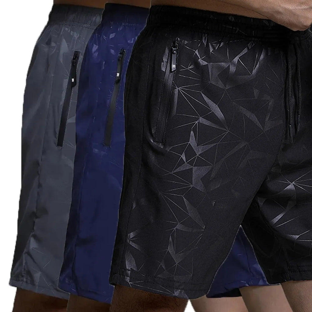 Men's loose grey polyester sports shorts with elastic waistband on a white background