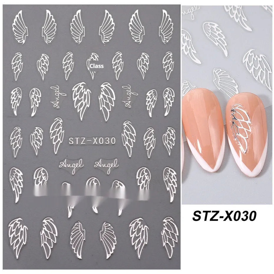 Close-up of a cartoon-style nail sticker with black and silver strips and a love pattern design on a fingernail.