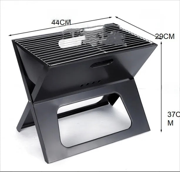 Black folding portable barbecue grill 44x29x37cm with carry handle outdoors