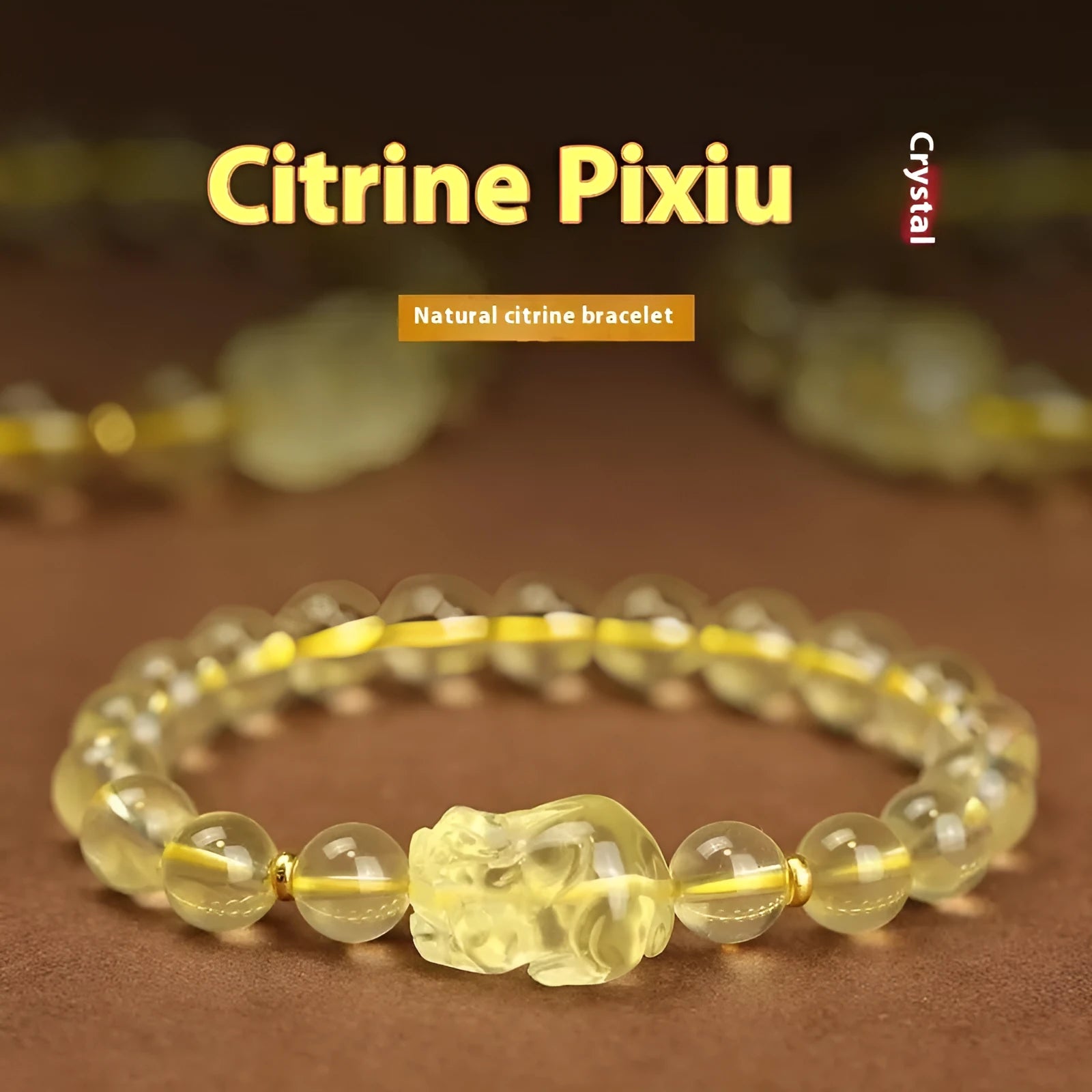 Yellow leather cord bracelet with artificial crystal beads and a Pi Xiu charm in Chinese folk style.