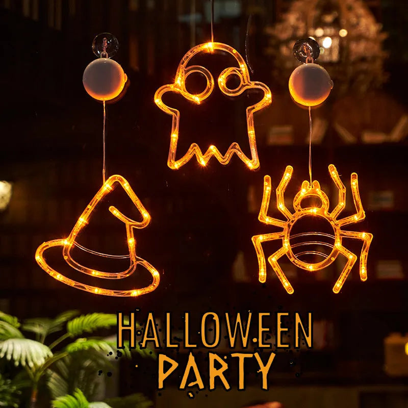Seven Halloween-themed LED hanging lights with suction cups including spiders, pumpkins and ghosts