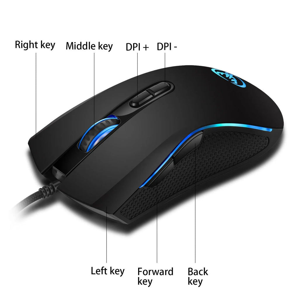 White and black gaming keyboard and mouse set with colour backlight on desk beside notebook computer