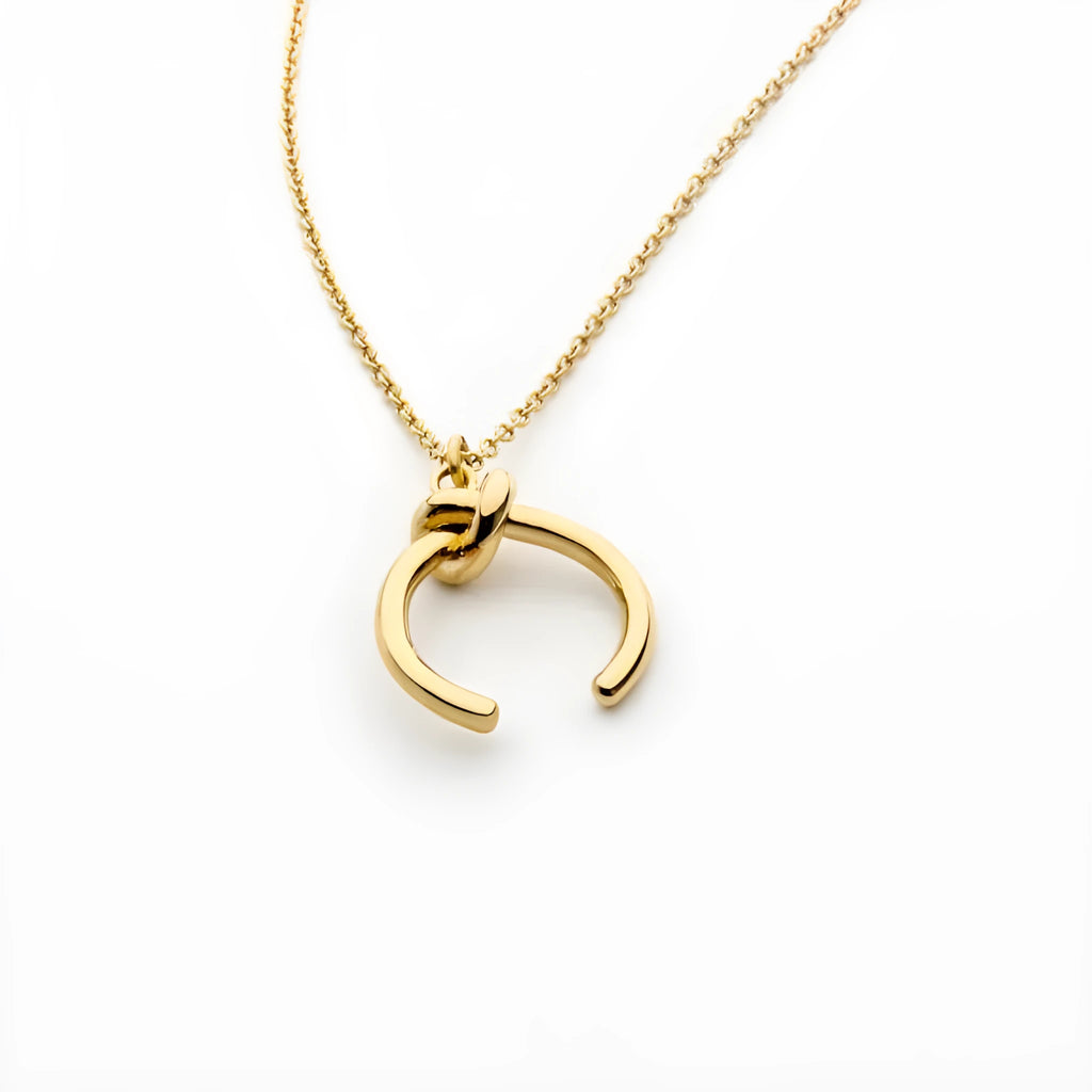 Adjustable copper pendant necklace with geometric design and cross chain in gold or silver finish