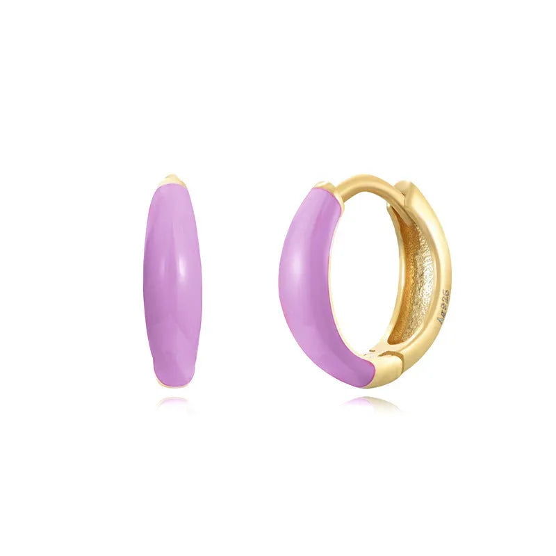 Geometric U-shaped epoxy earrings with a dripping oil finish in various colours.