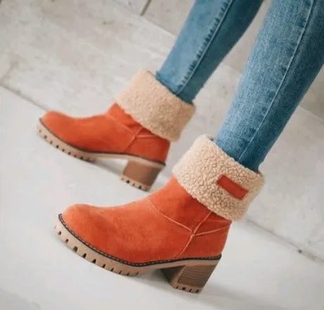 Women's mid-calf suede snow boots with a thick low heel and round toe in grey.