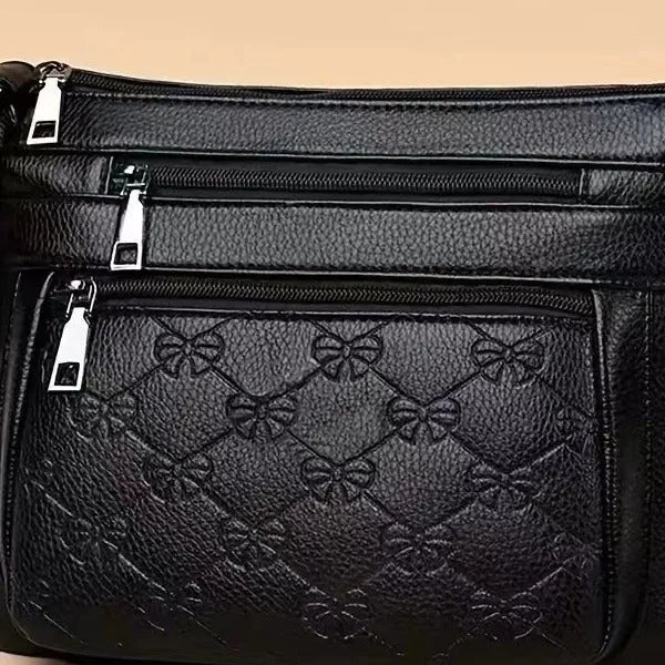 Black PU women's crossbody messenger bag with horizontal square shape and mobile phone compartment