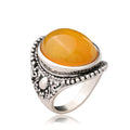 Geometric alloy ring with an antique silver amber electroplated finish.