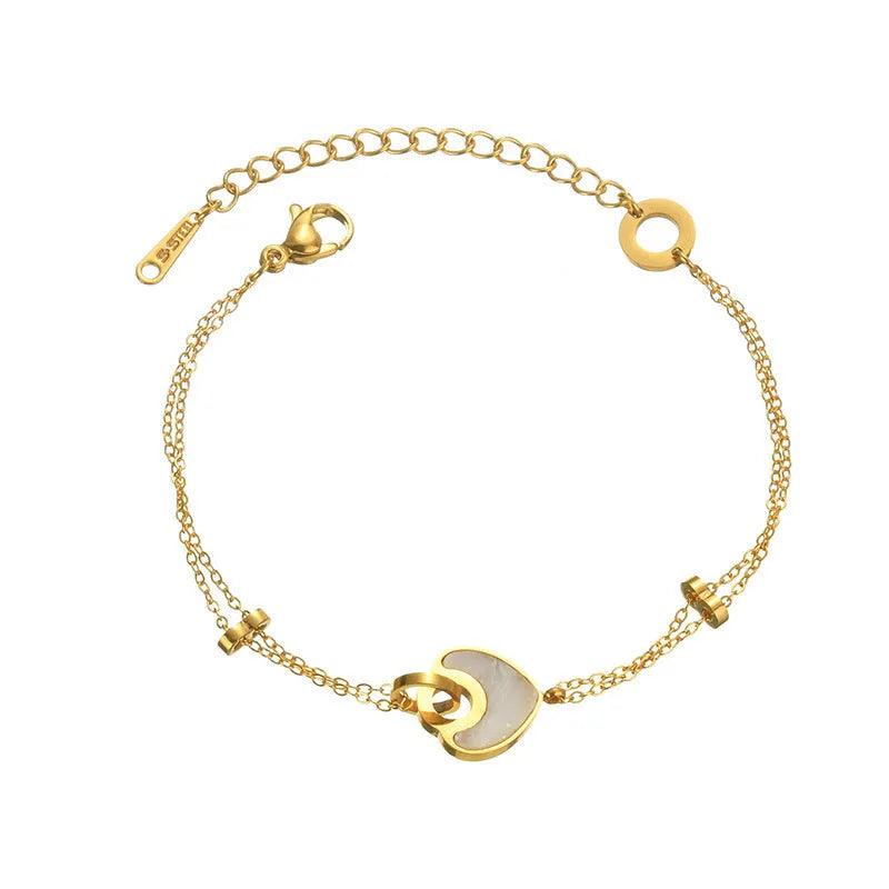 Ins style stainless steel and resin bracelet with a double-layered heart charm.