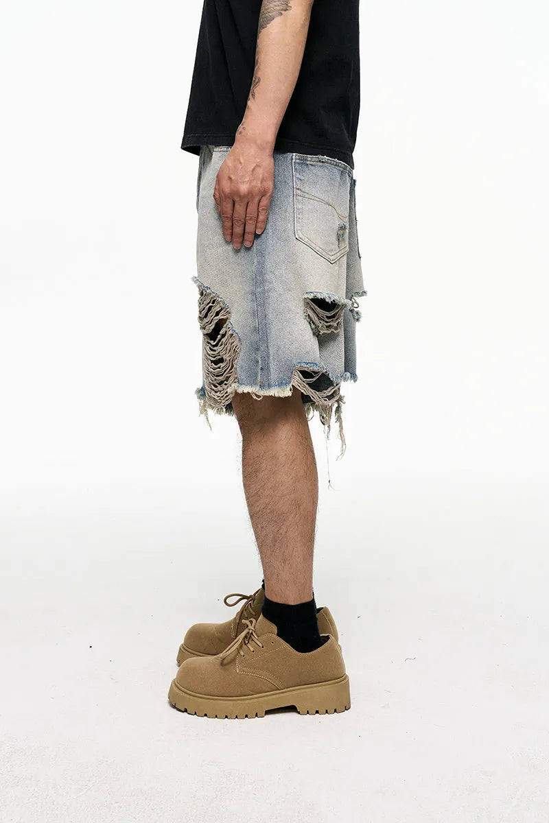 Men's light blue baggy denim shorts with wide leg design and mid waist