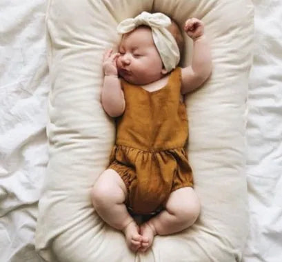 Portable baby nest crib measuring 75x45cm in cotton with PP cotton filler