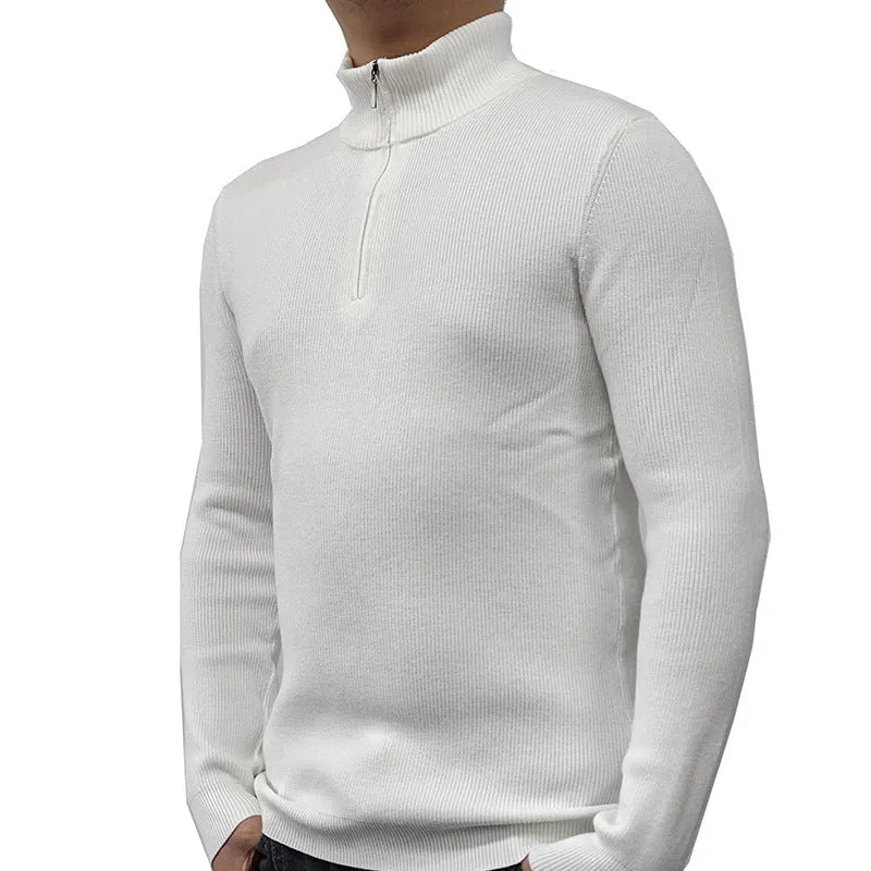 Man wearing a gray zip-front half-turtleneck long sleeve cotton blend sweater.