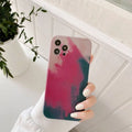 Soft silicone iPhone case with blue and purple geometric gradient abstract pattern.