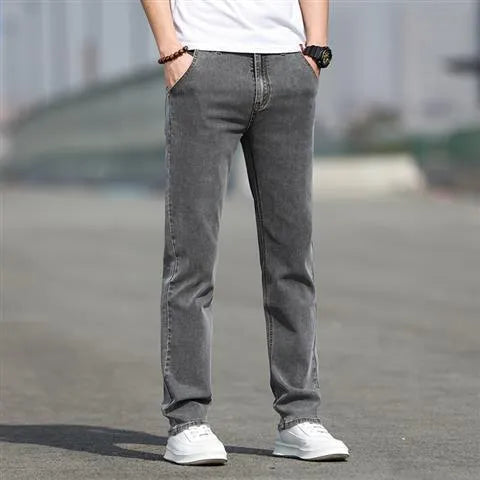 Men's smoky grey autumn jeans with straight tube fit and low waist design on hanger