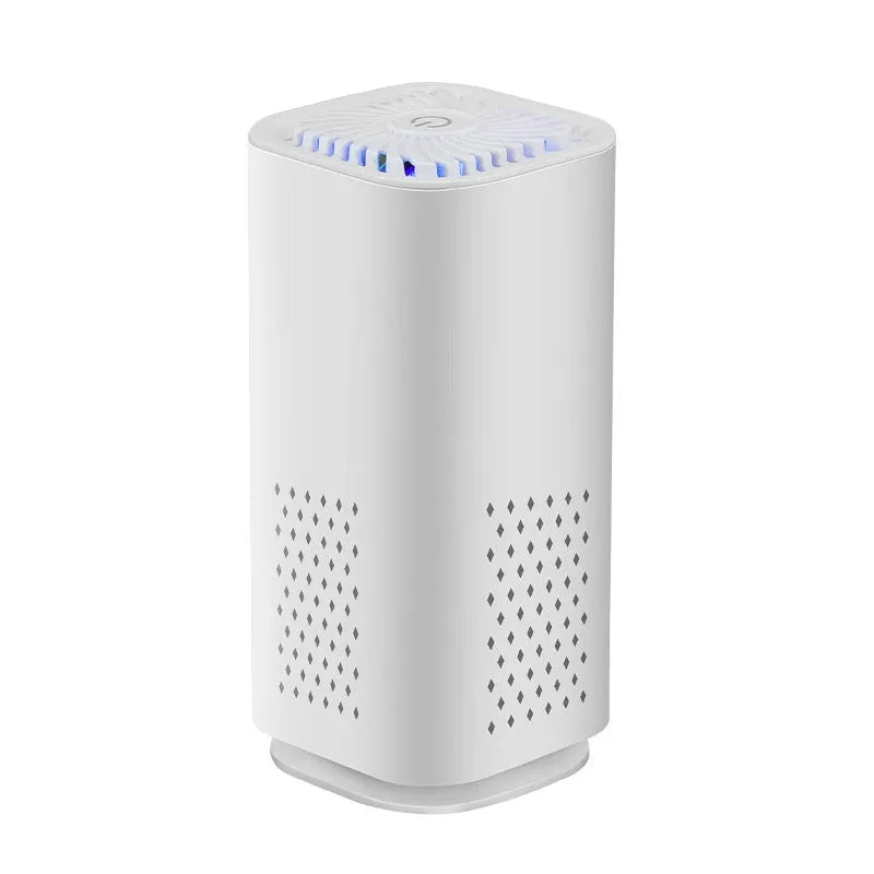 Mini black and white USB car air purifier with filter for small spaces.
