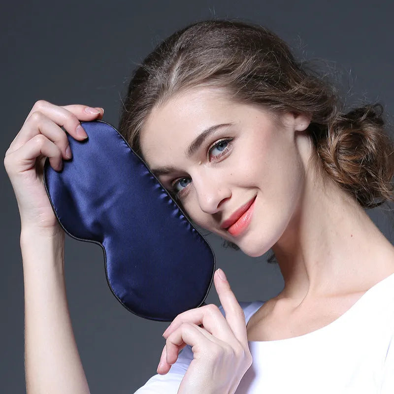 Double-sided Mulberry silk eye mask in a selection of colours including black, wine red, and ivory white.