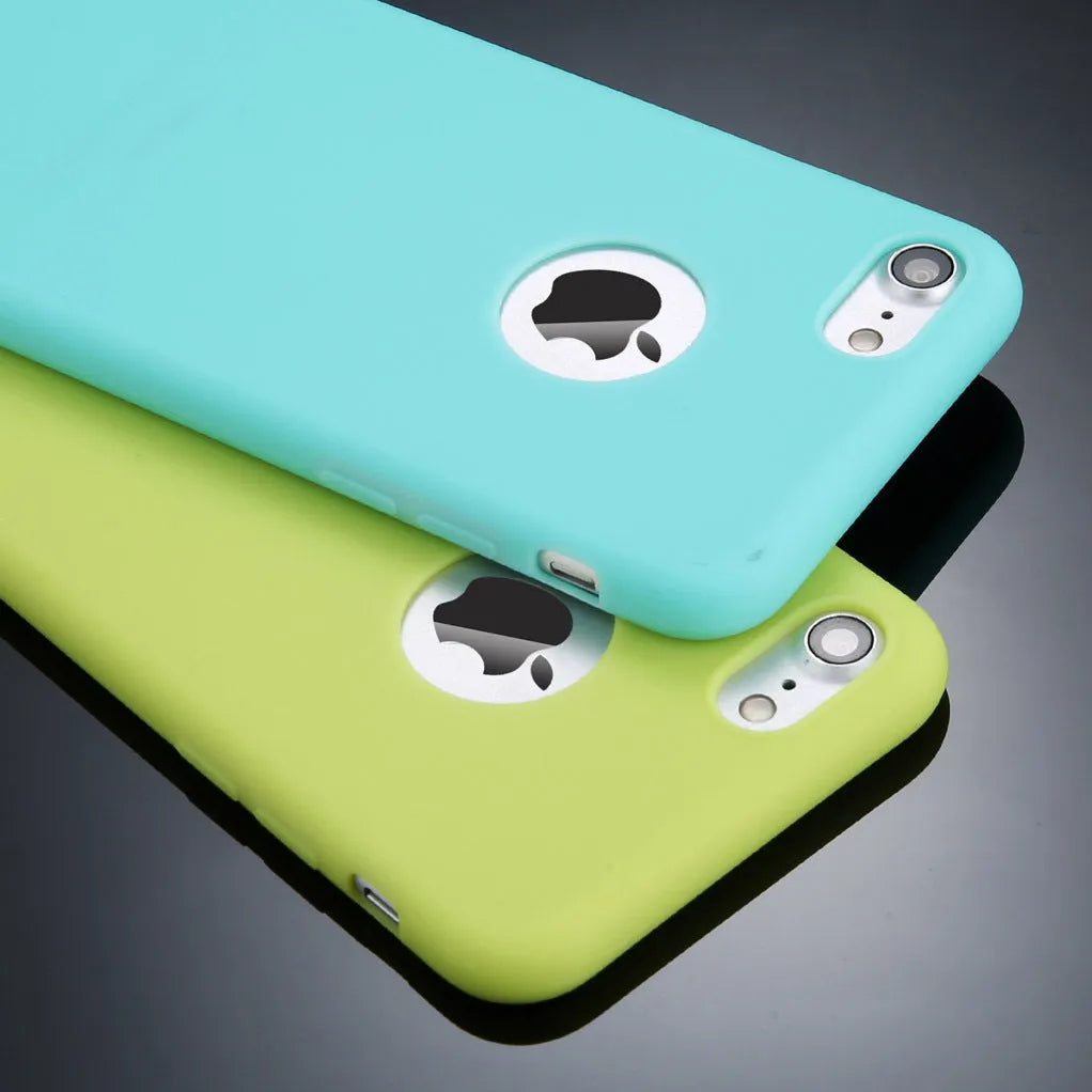 Soft silicone TPU phone case for iPhone in candy colours including pink, blue, and black on a plain background.