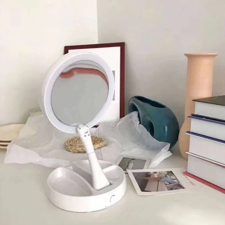White foldable LED vanity mirror with double-sided magnification and USB charging port