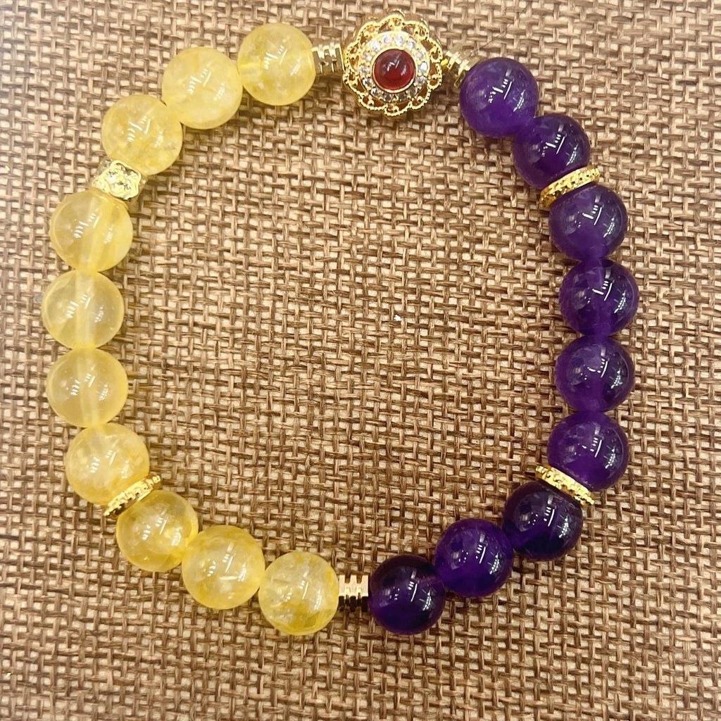 Handmade women's yellow and purple amethyst crystal bracelet with secure clasp fastening