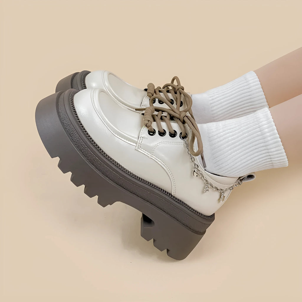 White women's platform leather shoes with chunky heel and lace-up front